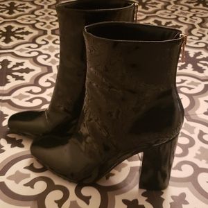 Shiny black faux leather booties